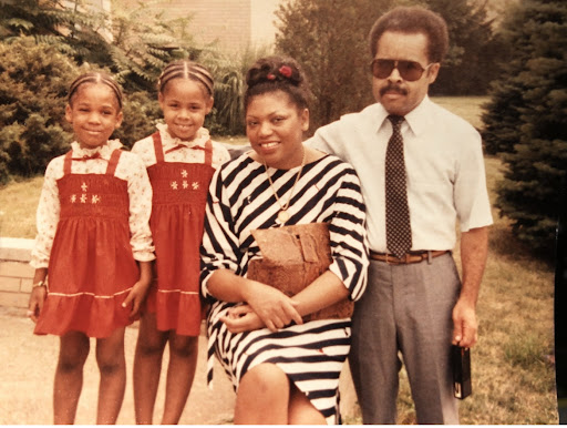 a young, Amoretta Morris, with her sister, mother, and father