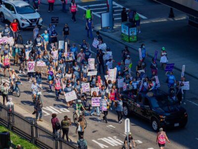 FreeHer protesters march down Tremont St on Saturday, Sept. 14. (Arthur Mansavage/ The Berkeley Beacon)